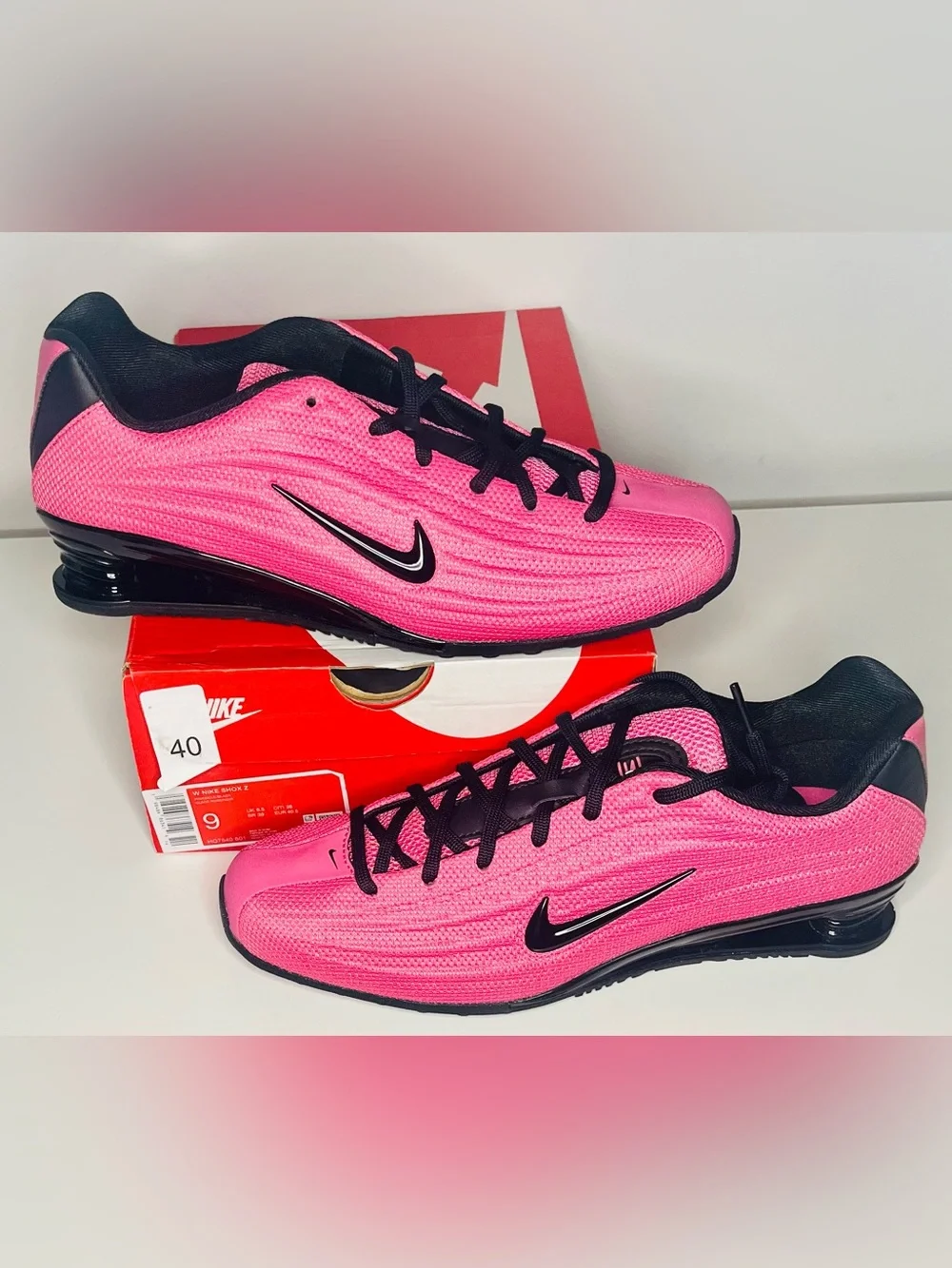 Nike Women’s Shox Pink Running Sneakers with Black Accents
